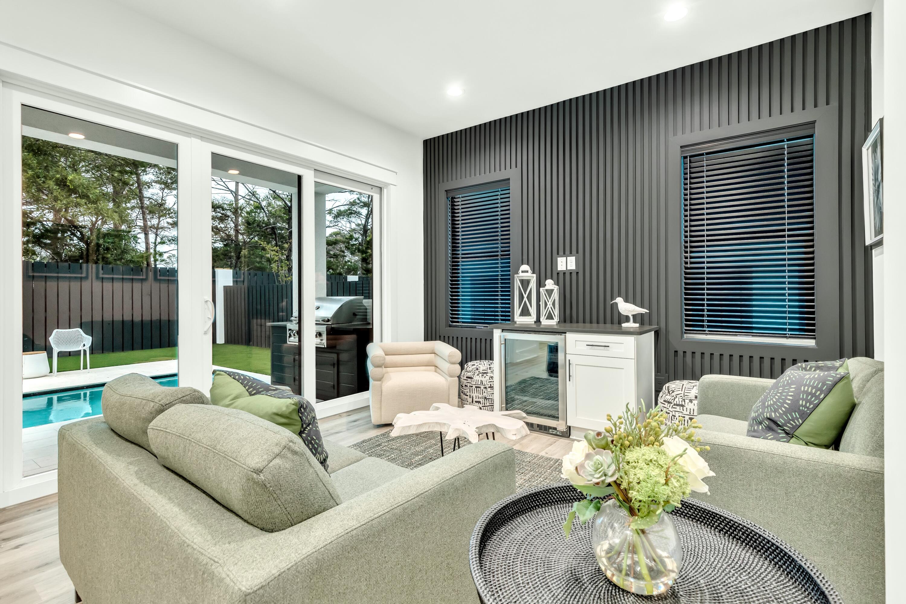 20 Sea Croft Drive Santa Rosa Beach, FL 32459 - Photo 5 of 54 a living room with furniture and a large window