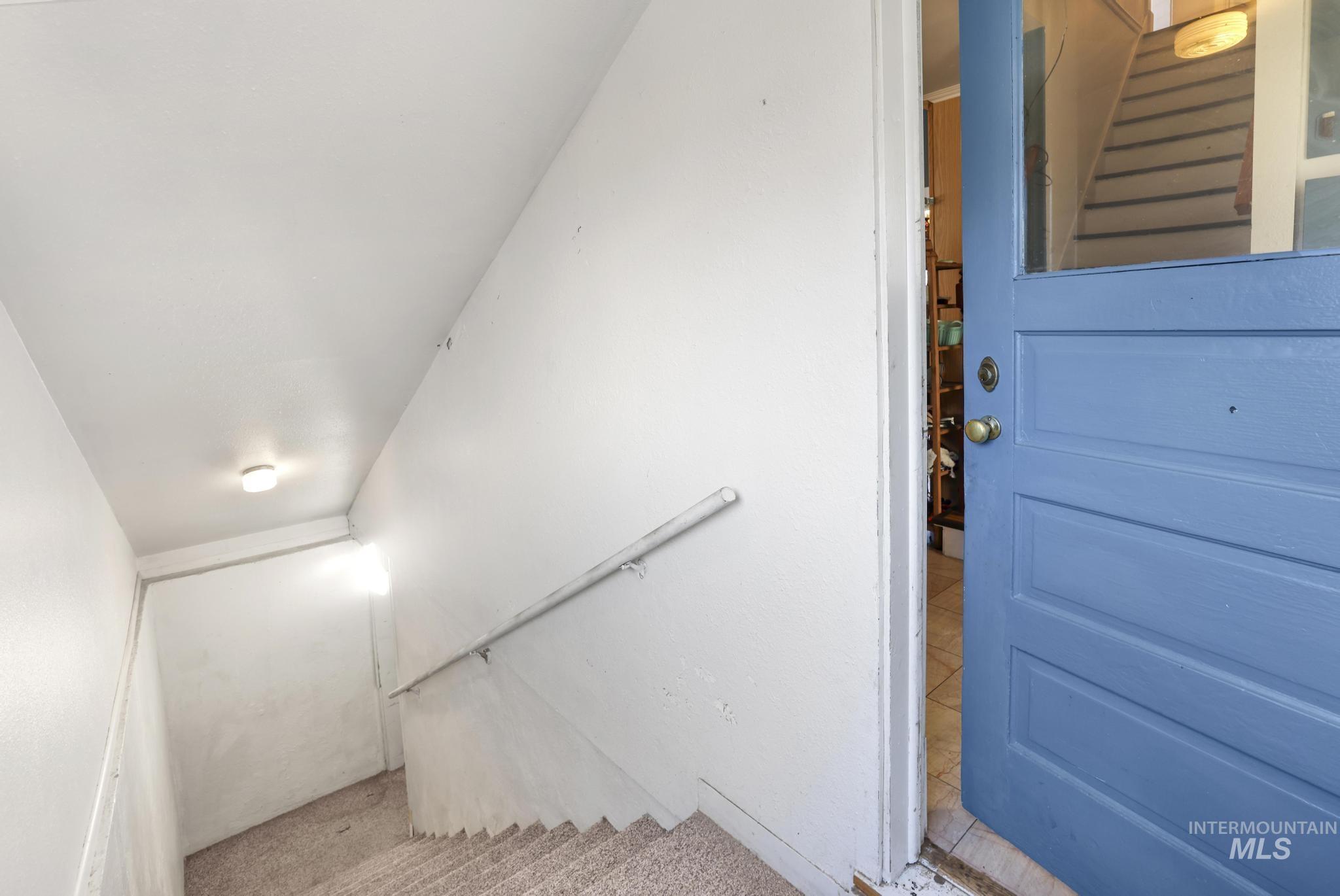 242 8th Avenue East Twin Falls, ID 83301 - Photo 26 of 39 Stairs featuring carpet floors