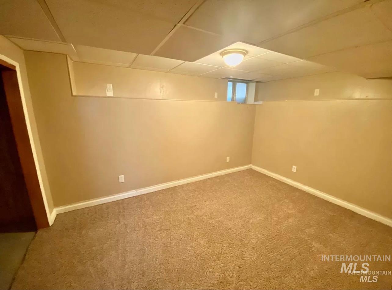 242 8th Avenue East Twin Falls, ID 83301 - Photo 28 of 35 Below grade area with carpet floors and baseboards