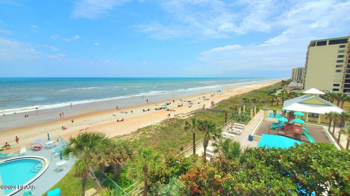 1575 Ocean Shore Boulevard, Unit 1003 Ormond Beach, FL 32176 - Photo 28 of 40 a view of an ocean and beach