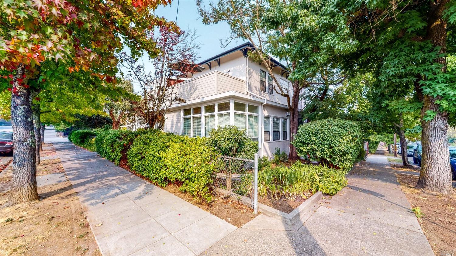 116 Clark Street San Rafael, CA 94901 - Photo 1 of 1 a front view of a house with a yard and potted plants