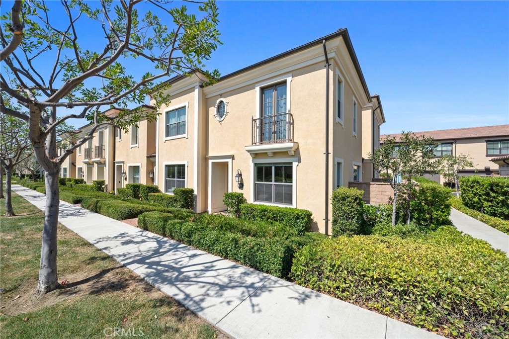 165 Working Ranch Irvine, CA 92602 - Photo 1 of 1 a front view of a house with garden