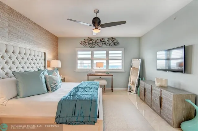 a bedroom with a bed and a cabinets