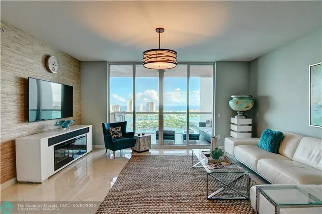 a view of a balcony with an outdoor seating