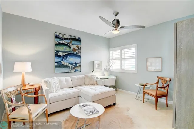 a kitchen with stainless steel appliances granite countertop a refrigerator a stove and a sink