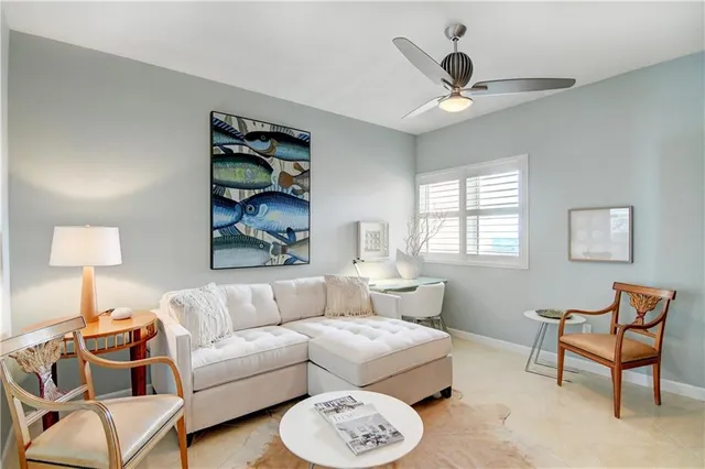 a view of an chairs and table in the patio
