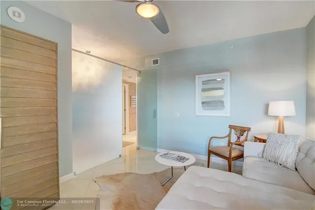 a kitchen with stainless steel appliances a refrigerator and a stove top oven