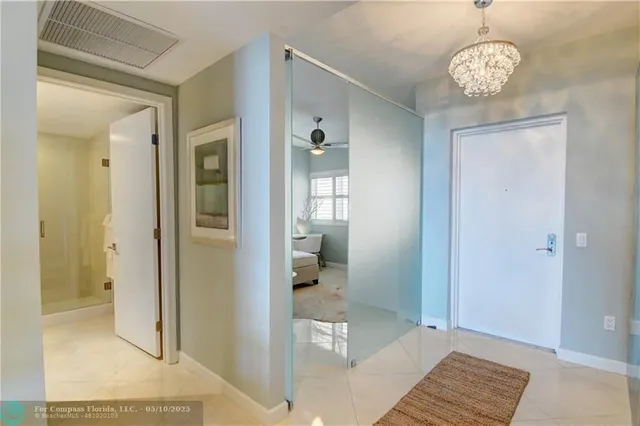 a view of an chairs and table in the patio