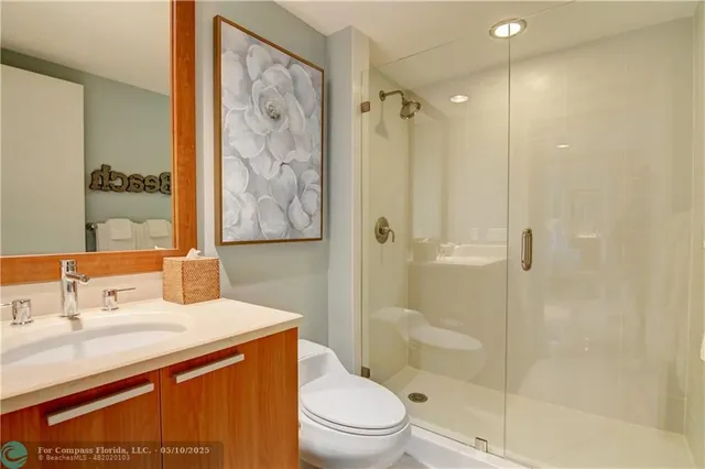 a view of a house with swimming pool and sitting area