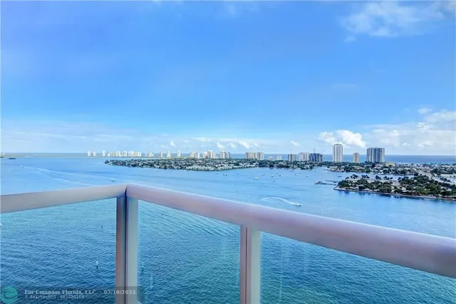 a living room with furniture and a lamp