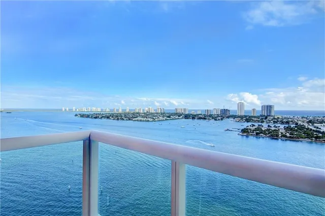 a living room with furniture and a lamp