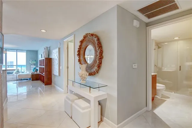 a view of a patio with swimming pool table and chairs