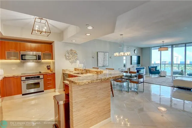 a view of a chairs and table in the patio