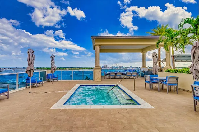 a view of a tennis ground with a large window