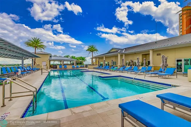 a view of a chairs and table in a terrace