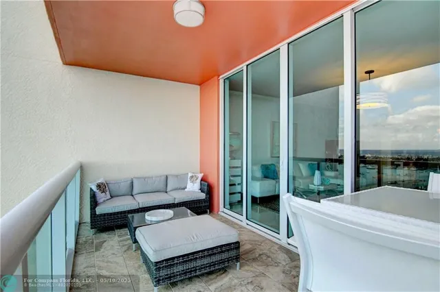 a bedroom with a bed and a ceiling fan