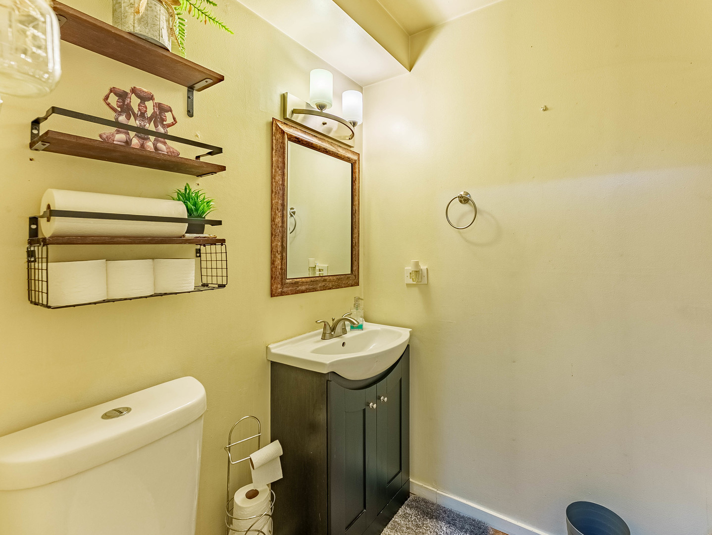 6337 Roosevelt Road, Unit 309 Berwyn, IL 60402 - Photo 7 of 27 a bathroom with a sink and a toilet