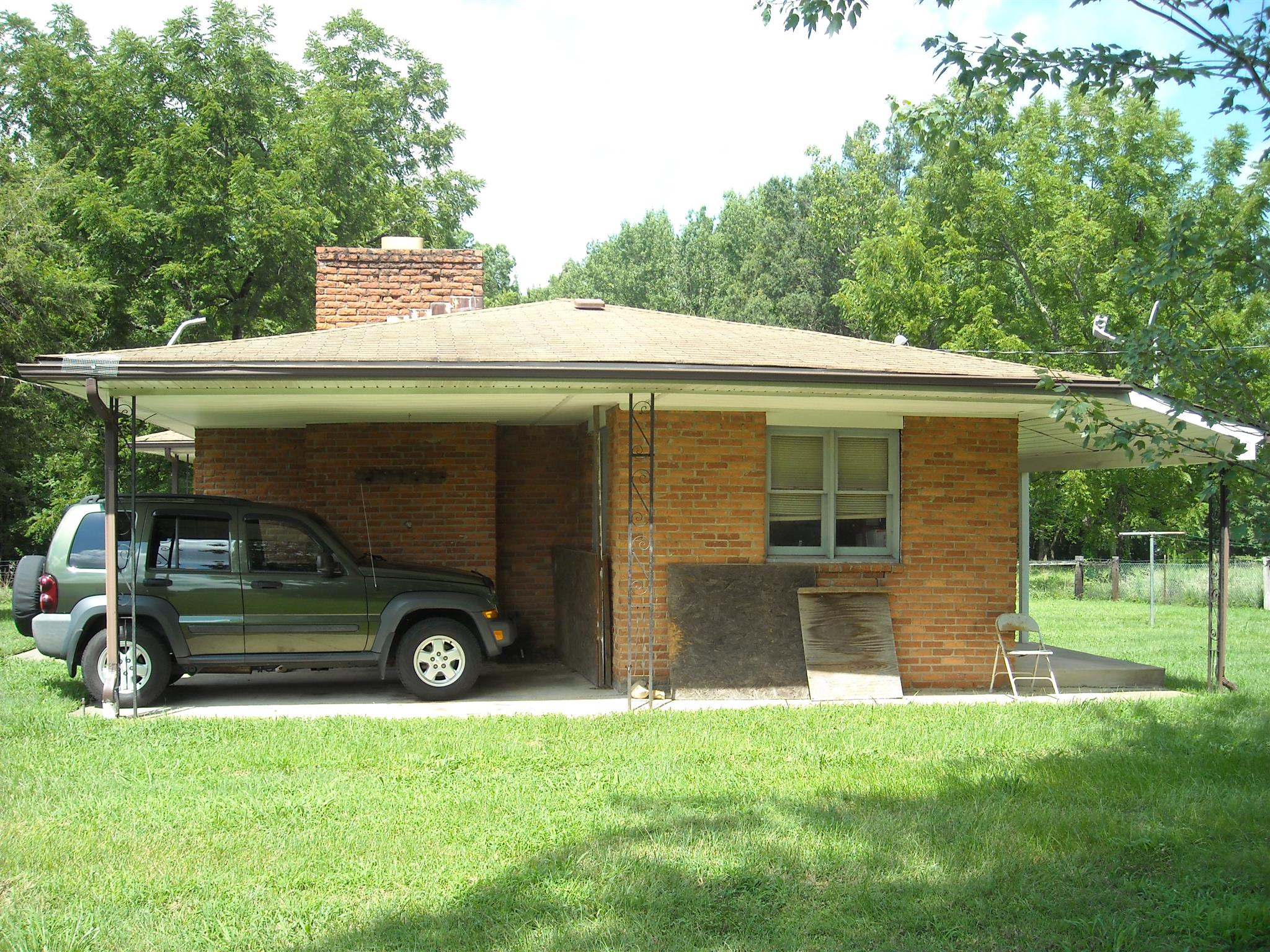 2152 Chambliss Road Pleasant View, TN 37146 - Photo 14 of 24 a view of a house with a yard