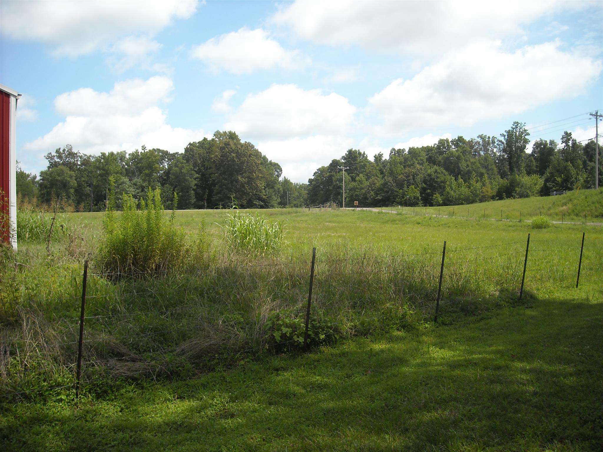 2152 Chambliss Road Pleasant View, TN 37146 - Photo 23 of 24 a view of a grassy field