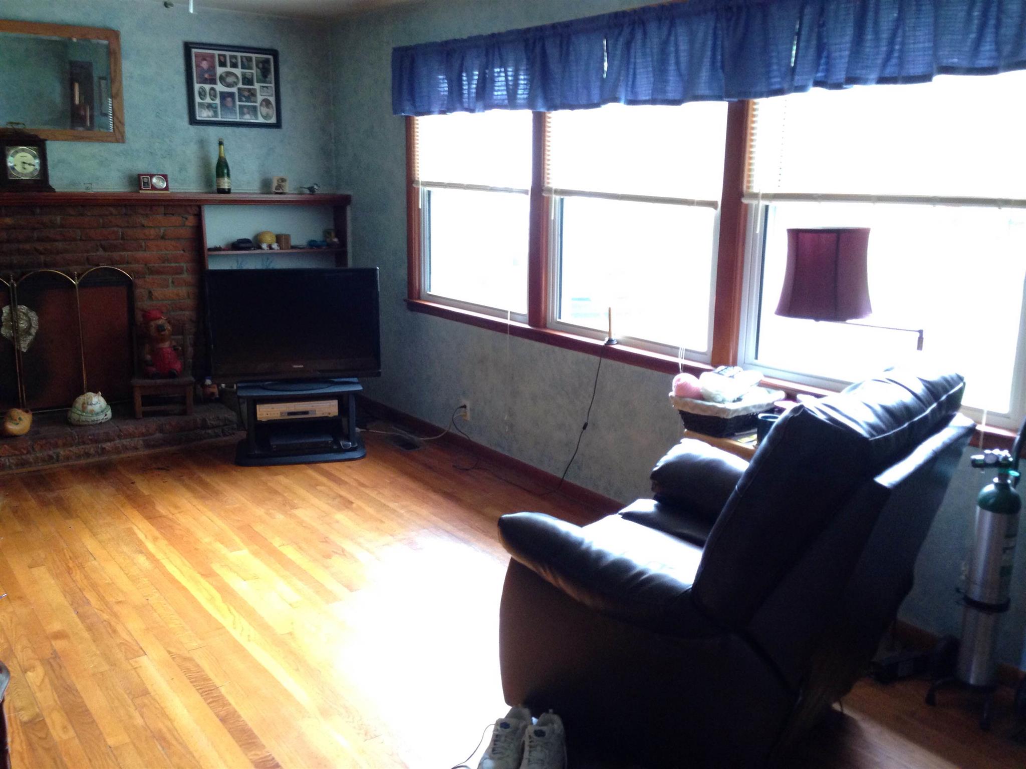2152 Chambliss Road Pleasant View, TN 37146 - Photo 9 of 24 a living room with furniture and a window