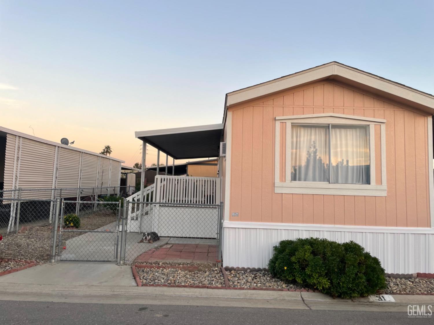 Undisclosed Address Bakersfield, CA 93304 - Photo 1 of 24 a backyard of a house