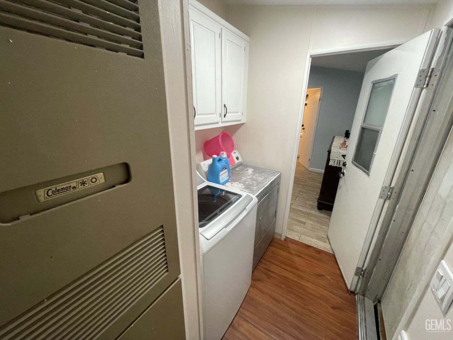 Undisclosed Address Bakersfield, CA 93304 - Photo 15 of 24 a hallway with washer and dryer