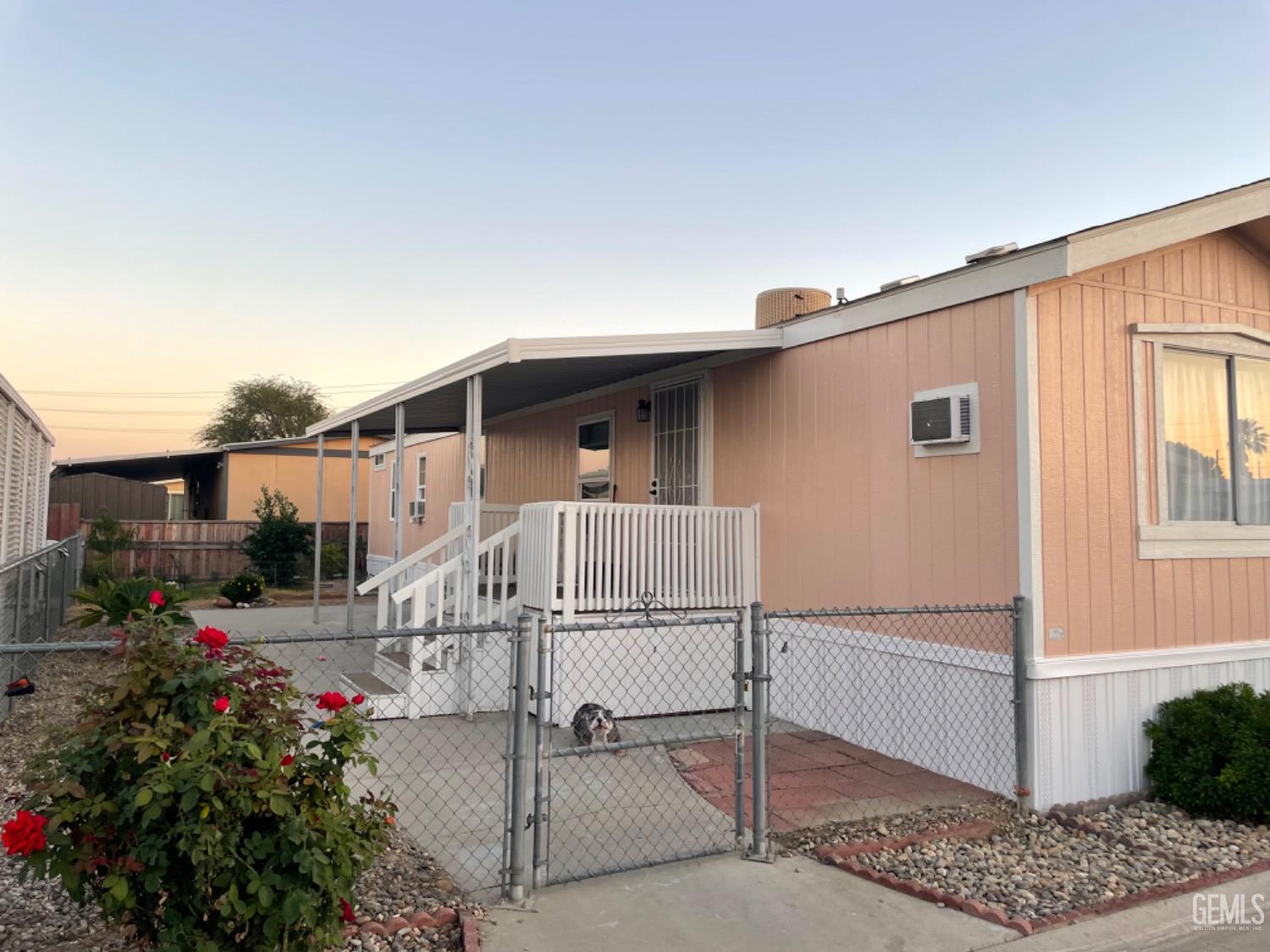 Undisclosed Address Bakersfield, CA 93304 - Photo 5 of 24 a house view with a outdoor space