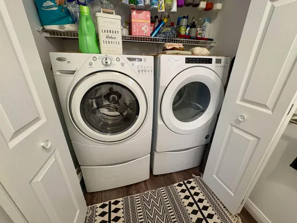 a utility room with dryer and washer
