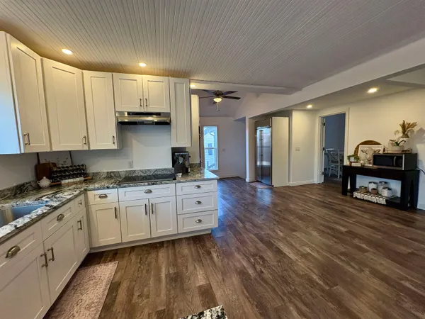 a large kitchen with cabinets