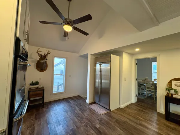 a view of entryway with wooden floor