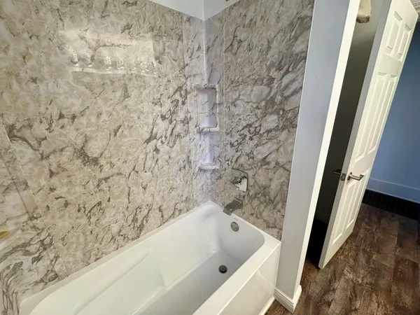 a bathroom with a bathtub