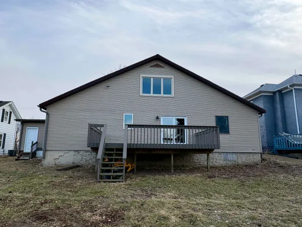 a house view with a backyard space