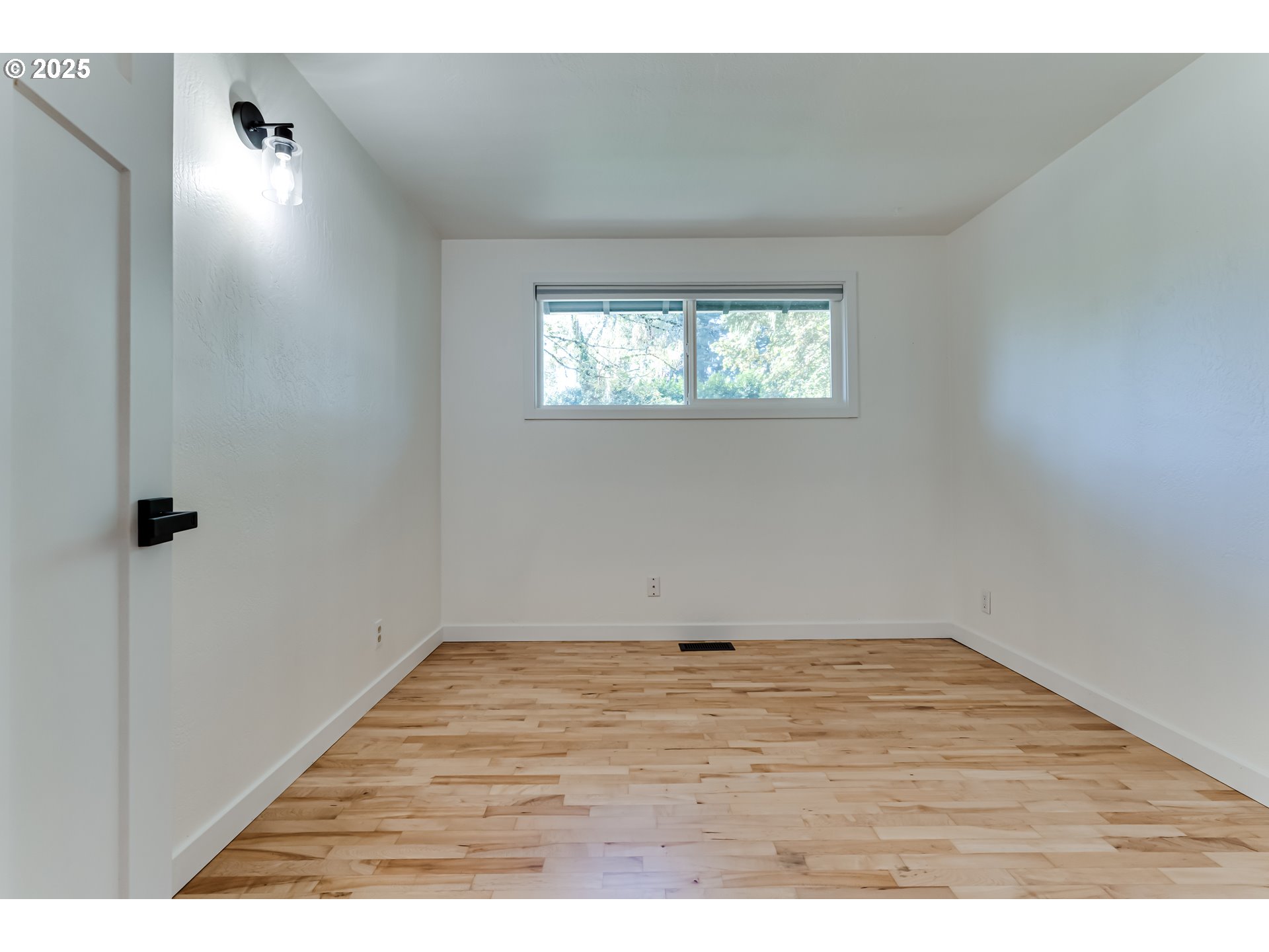 395 Fairway Loop Eugene, OR 97401 - Photo 12 of 37 a view of empty room with wooden floor