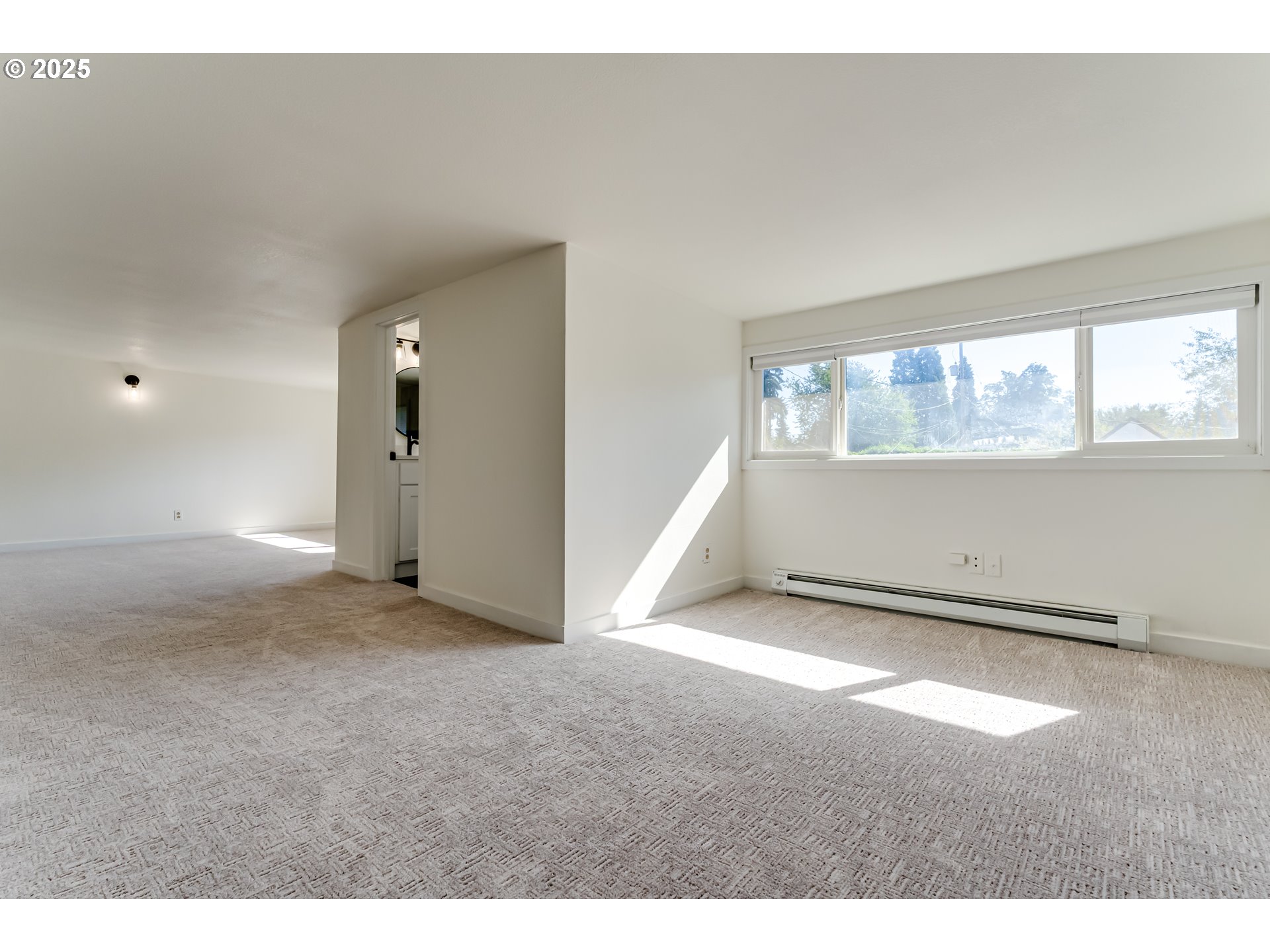 395 Fairway Loop Eugene, OR 97401 - Photo 23 of 37 a view of an empty room with a window
