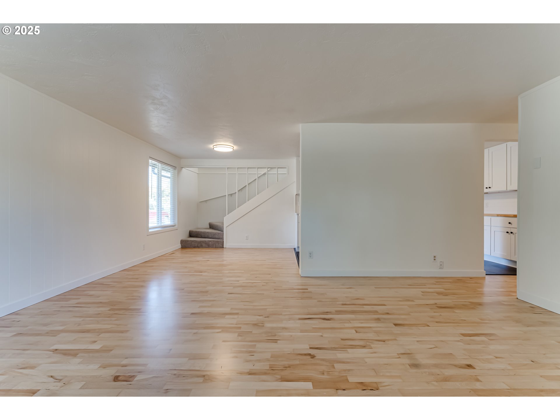 395 Fairway Loop Eugene, OR 97401 - Photo 4 of 37 a view of empty room with wooden floor