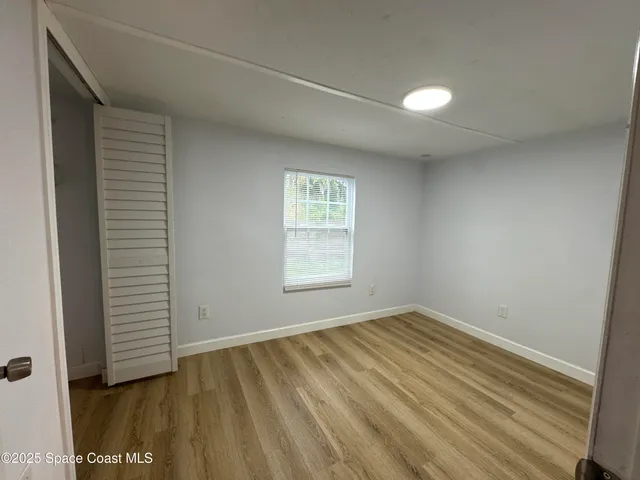a bathroom with a toilet a sink and bathtub