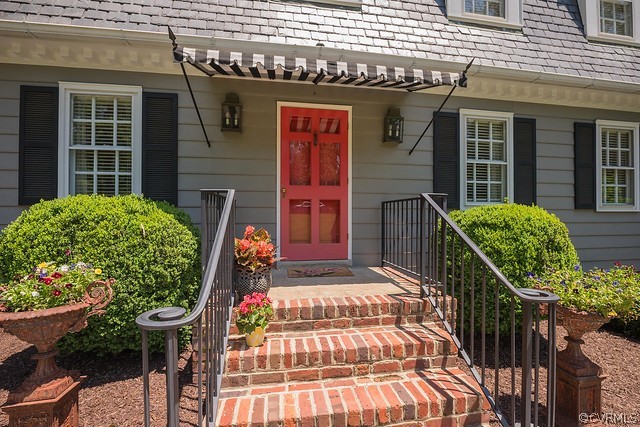 7720 Kenmore Circle Richmond, VA 23225 - Photo 1 of 48 a front view of house with an outdoor seating