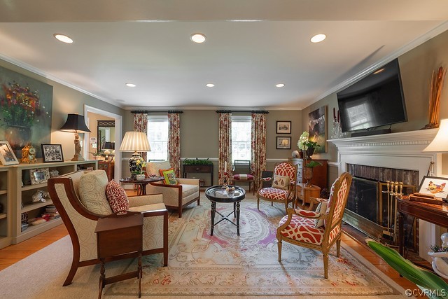 7720 Kenmore Circle Richmond, VA 23225 - Photo 13 of 48 a living room with fireplace furniture and a flat screen tv