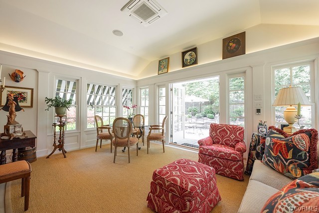 7720 Kenmore Circle Richmond, VA 23225 - Photo 16 of 48 a living room with furniture and large windows