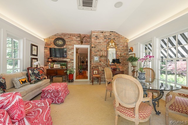 7720 Kenmore Circle Richmond, VA 23225 - Photo 17 of 48 a living room with fireplace furniture and a window