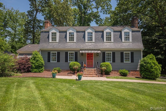 7720 Kenmore Circle Richmond, VA 23225 - Photo 2 of 48 a front view of a house with garden