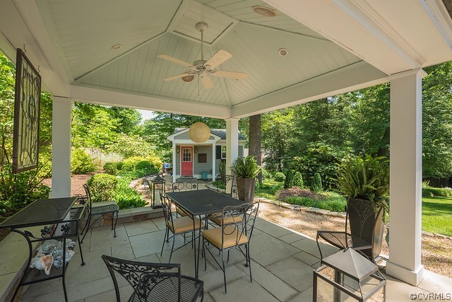 7720 Kenmore Circle Richmond, VA 23225 - Photo 21 of 48 a patio with yard glass top table and chairs