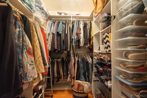 7720 Kenmore Circle Richmond, VA 23225 - Photo 25 of 48 a view of walk in closet with clothes