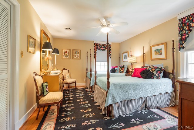 7720 Kenmore Circle Richmond, VA 23225 - Photo 29 of 48 a living room with furniture and wooden floor