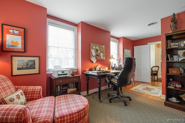 7720 Kenmore Circle Richmond, VA 23225 - Photo 30 of 48 a view of a livingroom with workspace and a window