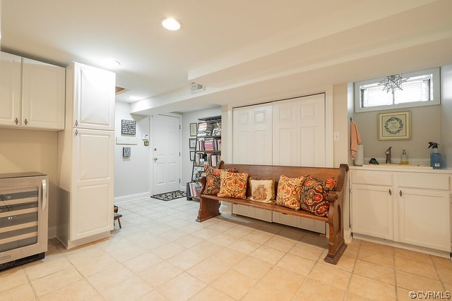 7720 Kenmore Circle Richmond, VA 23225 - Photo 33 of 48 a spacious bedroom with a bed and cabinets