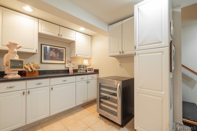 7720 Kenmore Circle Richmond, VA 23225 - Photo 35 of 48 a kitchen with granite countertop white cabinets and white appliances