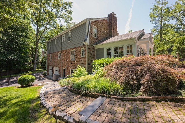 7720 Kenmore Circle Richmond, VA 23225 - Photo 37 of 48 a front view of a house with garden