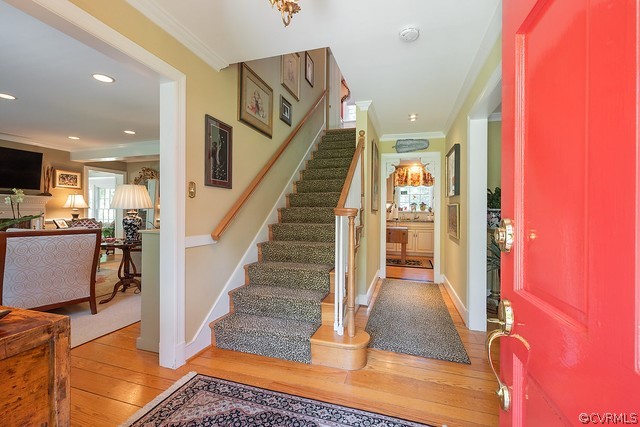 7720 Kenmore Circle Richmond, VA 23225 - Photo 6 of 48 a view of entryway and hall with wooden floor