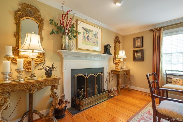 7720 Kenmore Circle Richmond, VA 23225 - Photo 8 of 48 a living room with furniture and a fireplace